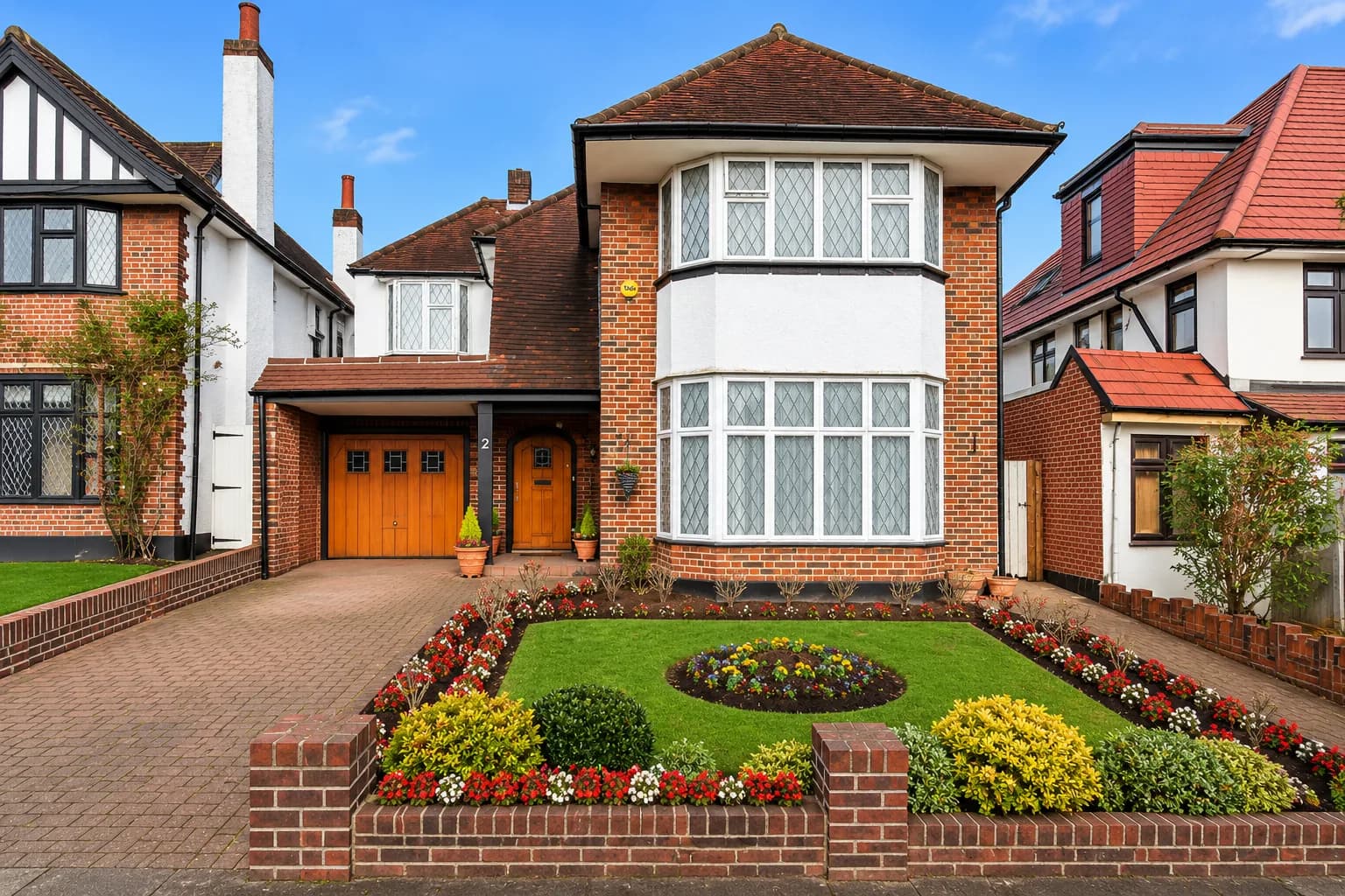 Tudor-Style Home with Flower Garden